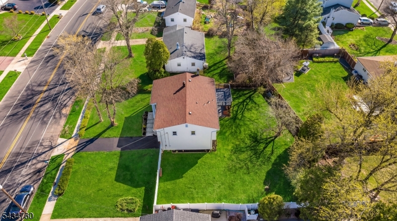 641 Ydv-ham Sq Road Robbinsville, NJ 08691 - Photo 44 of 49 an aerial view of a house with a garden and trees