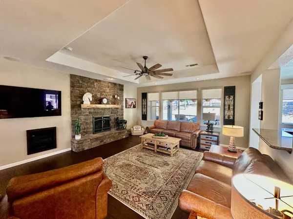 a kitchen with stainless steel appliances granite countertop a refrigerator stove and oven