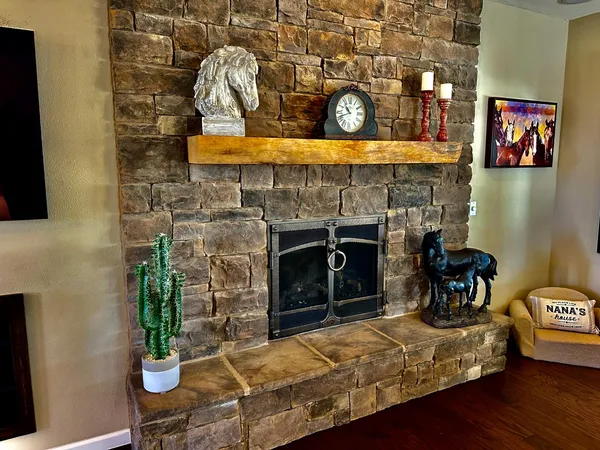 a kitchen with stainless steel appliances granite countertop a refrigerator and a stove