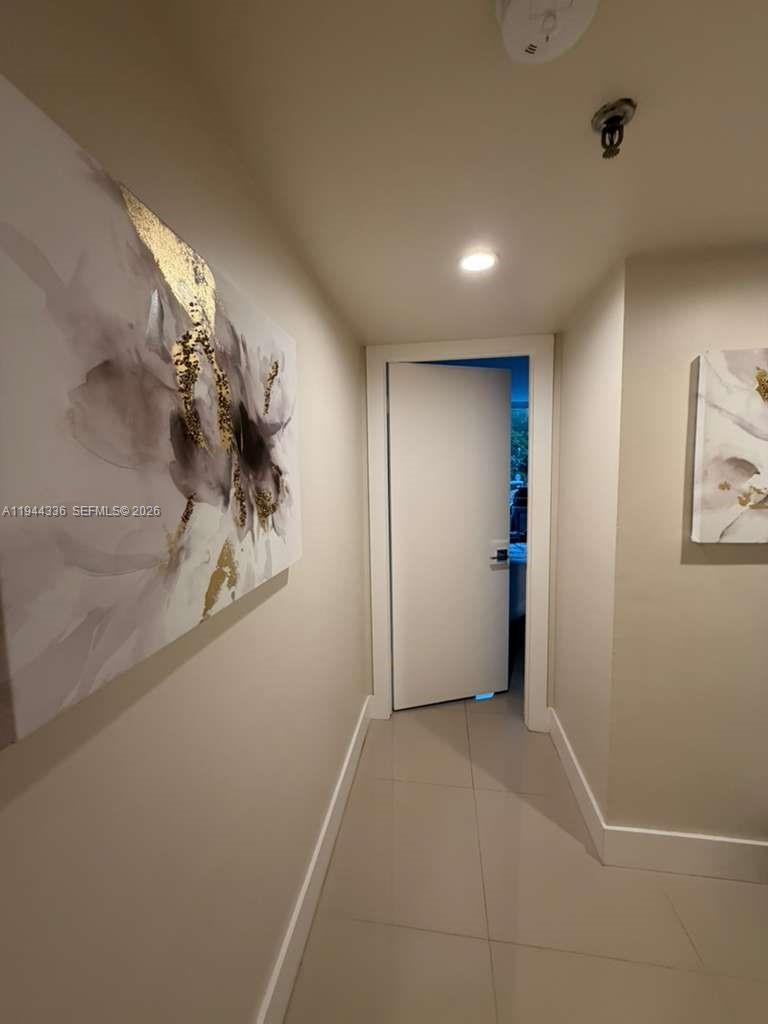 17890 West Dixie Highway, Unit 210 North Miami Beach, FL 33160 - Photo 16 of 19 a view of a hallway