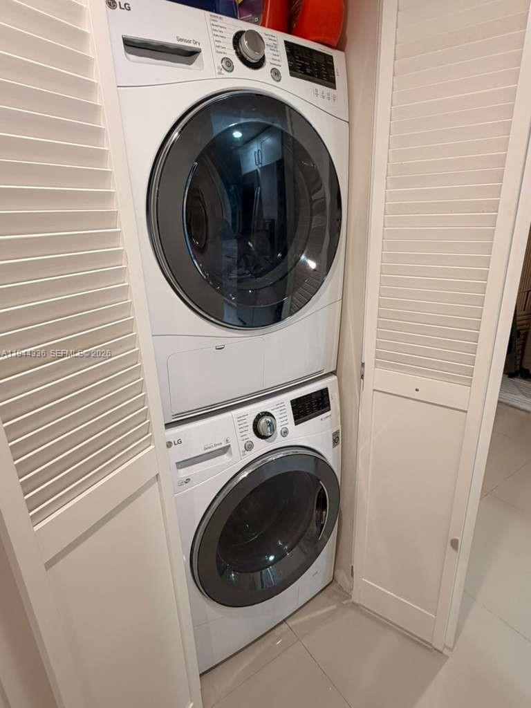 17890 West Dixie Highway, Unit 210 North Miami Beach, FL 33160 - Photo 18 of 19 a utility room with dryer and washer
