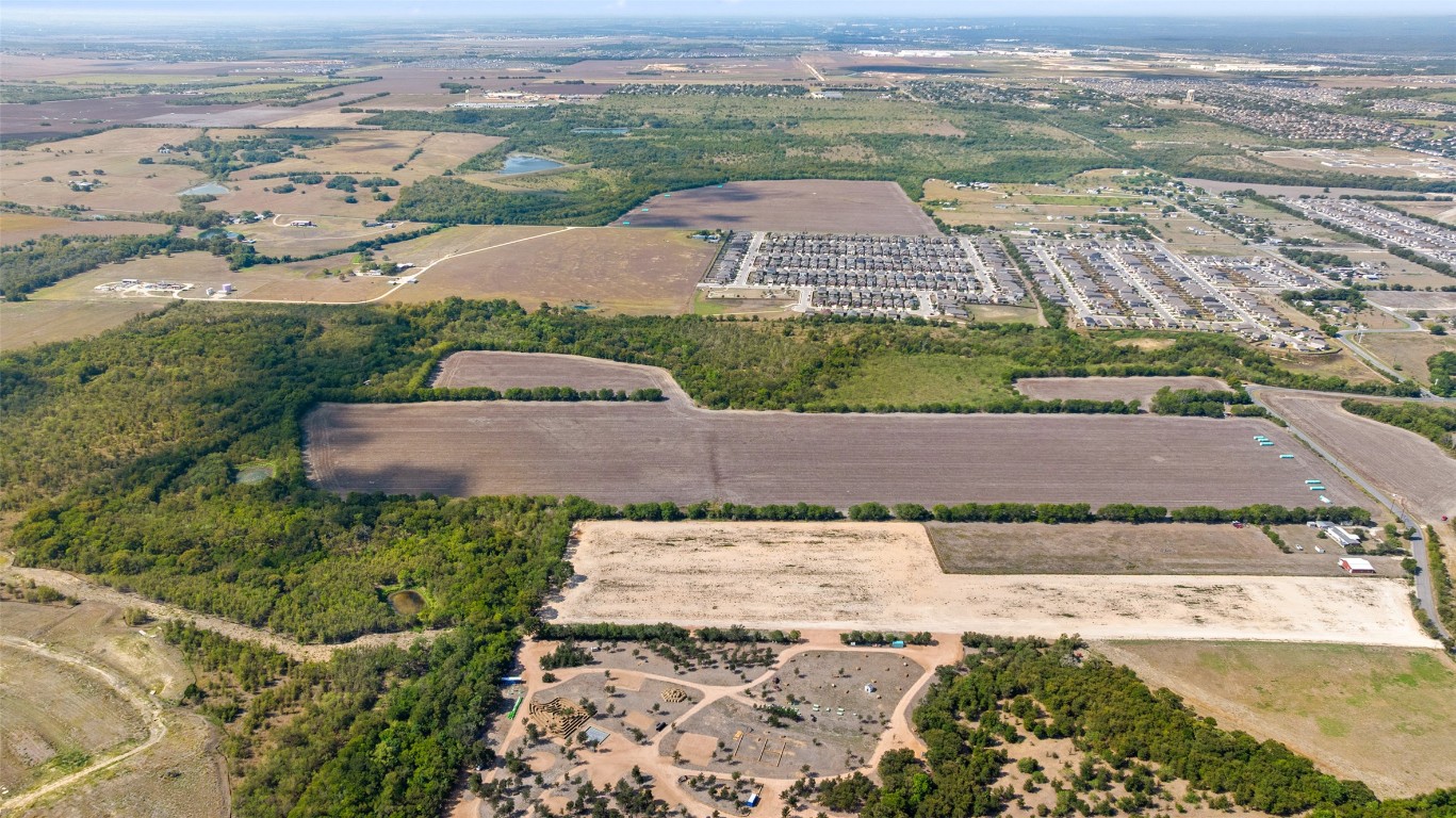 Dairy Dairy Road Kyle, TX 78640 - Photo 6 of 22 an aerial view of a house with a yard