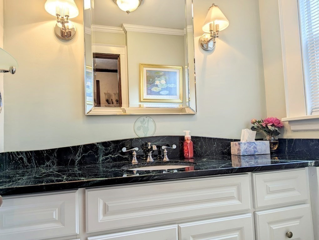 43 Brunswick Road Arlington, MA 02476 - Photo 24 of 42 a kitchen with a sink and cabinets