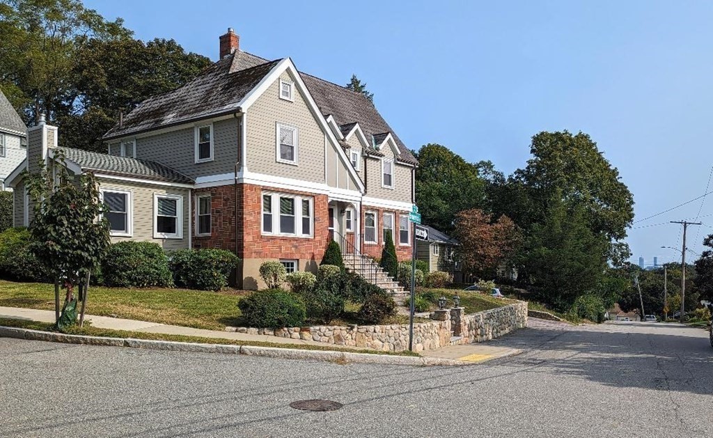 43 Brunswick Road Arlington, MA 02476 - Photo 3 of 42 a front view of a house with a garden