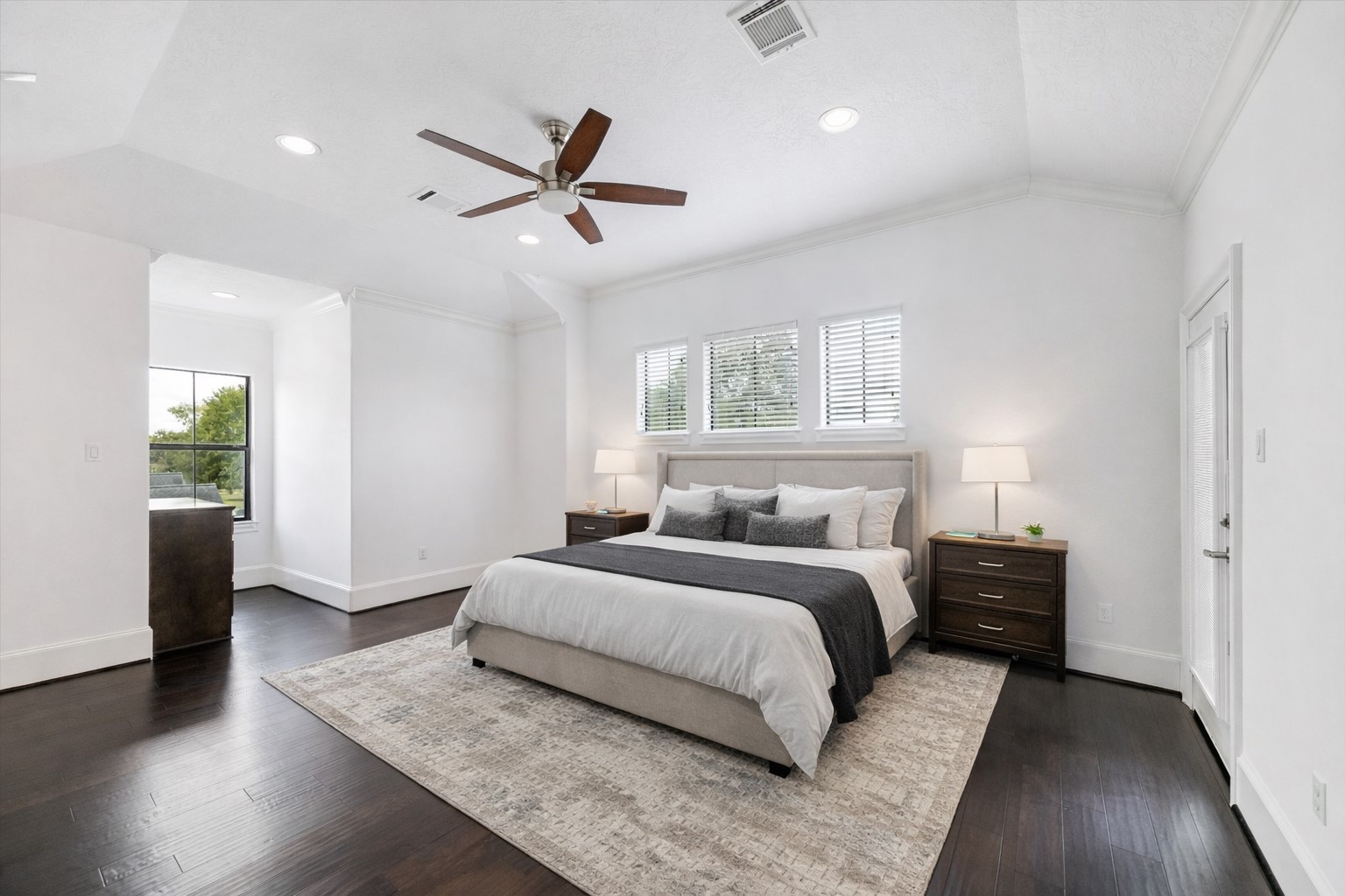 3942 Charleston Street Houston, TX 77021 - Photo 22 of 34 a bedroom with a bed and wooden floor