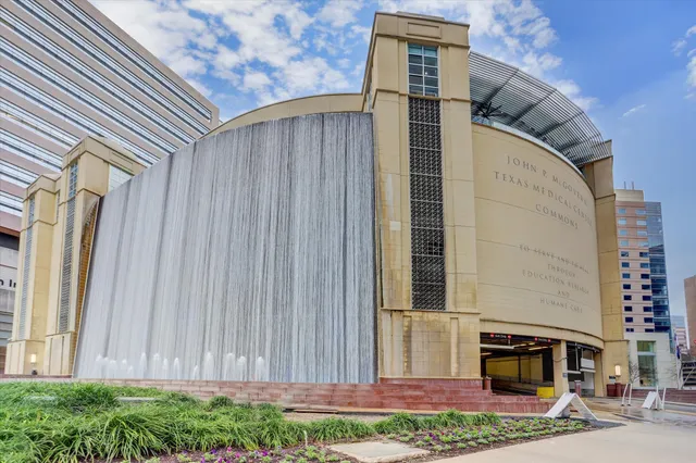 a view of a swimming pool with a lounge chairs