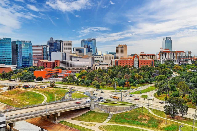 an aerial view of a house with outdoor space