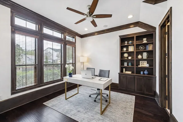 a work room with furniture and a window