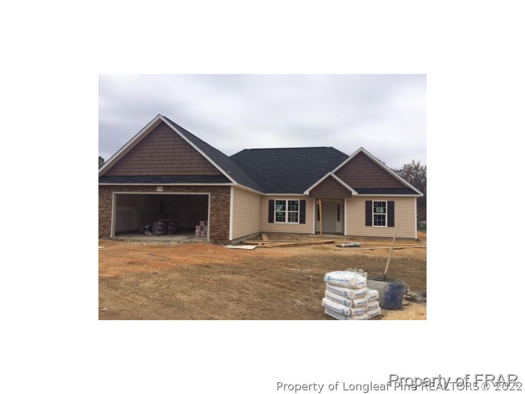 3126 Thrower Road Hope Mills, NC 28348 - Photo 1 of 22 a view of a front door of house