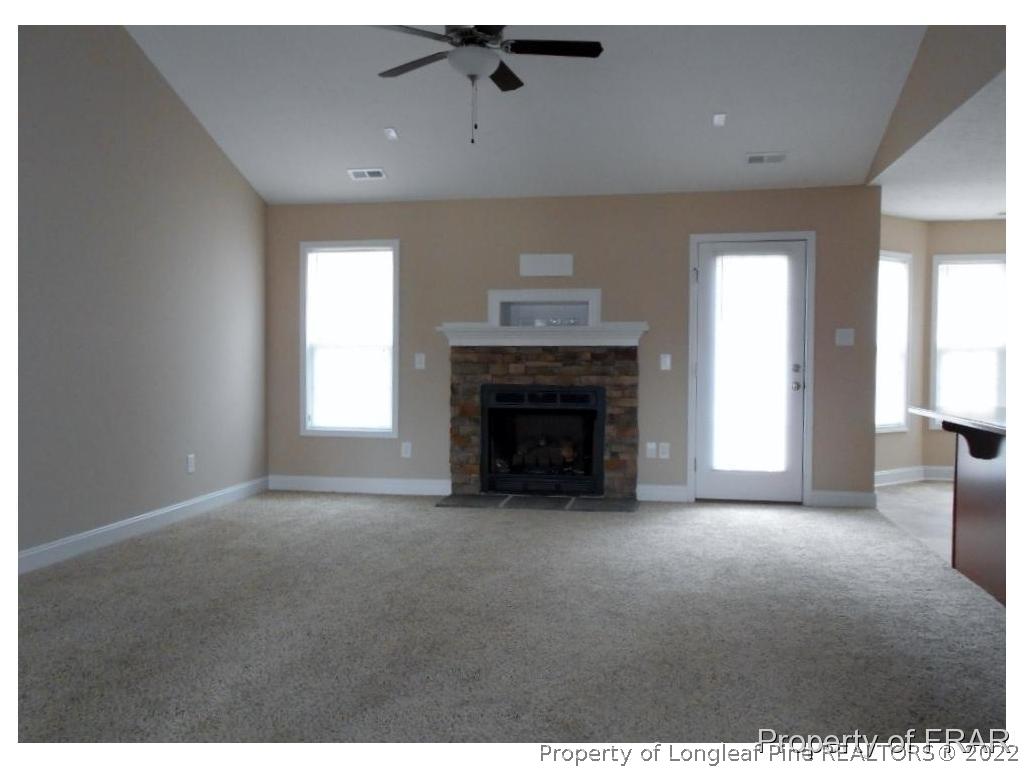3126 Thrower Road Hope Mills, NC 28348 - Photo 3 of 22 a view of empty room with a fireplace