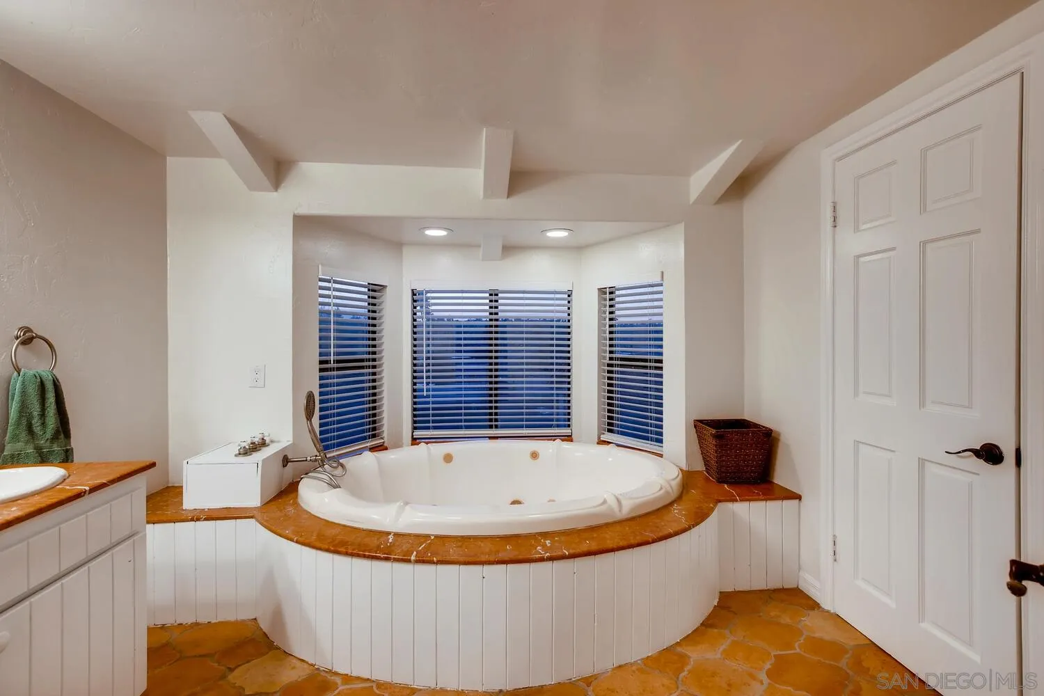 13992 Putney Road Poway, CA 92064 - Photo 25 of 38 a bathroom with a tub and sink