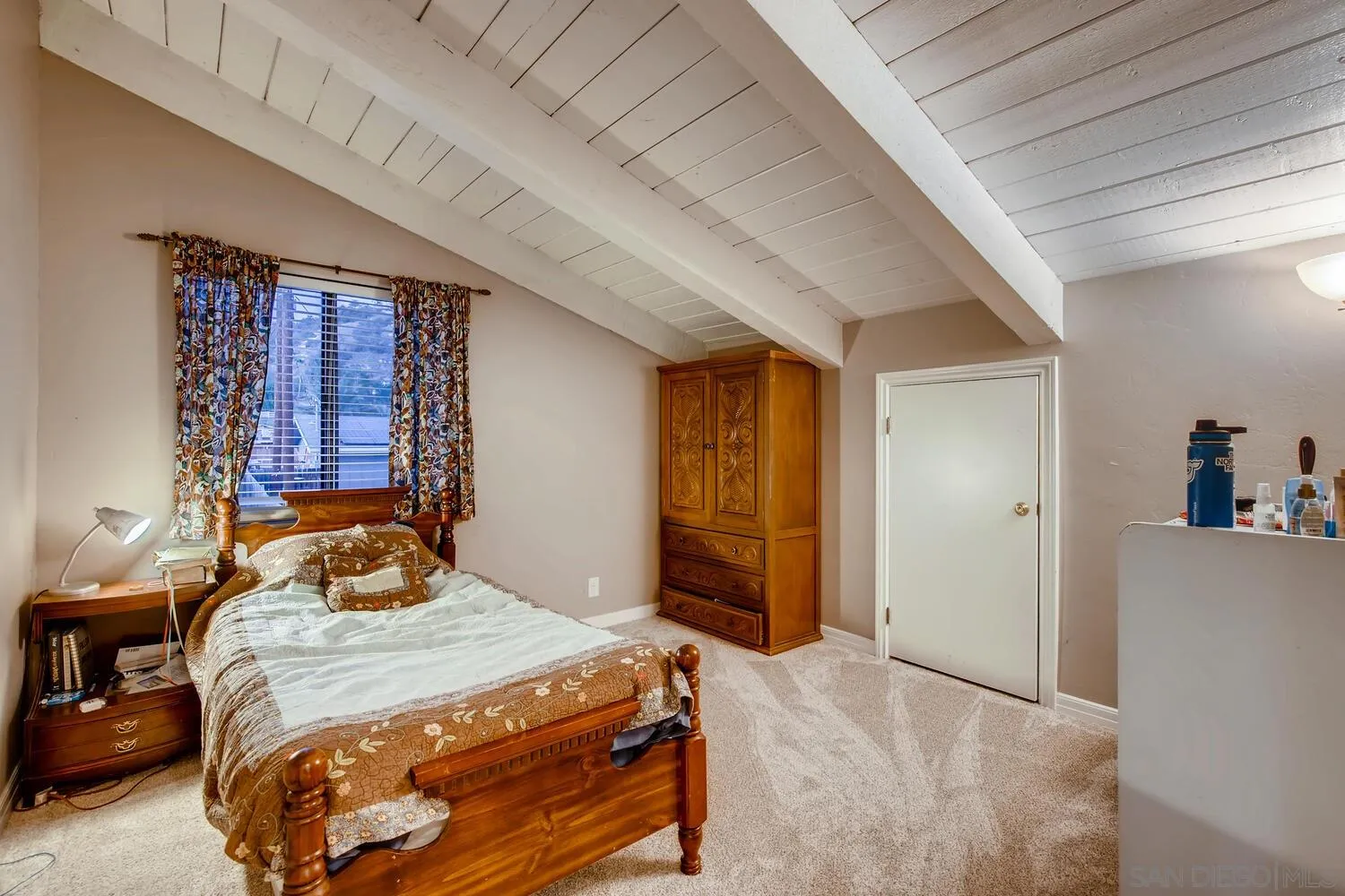 13992 Putney Road Poway, CA 92064 - Photo 29 of 38 a bedroom with a bed and a closet