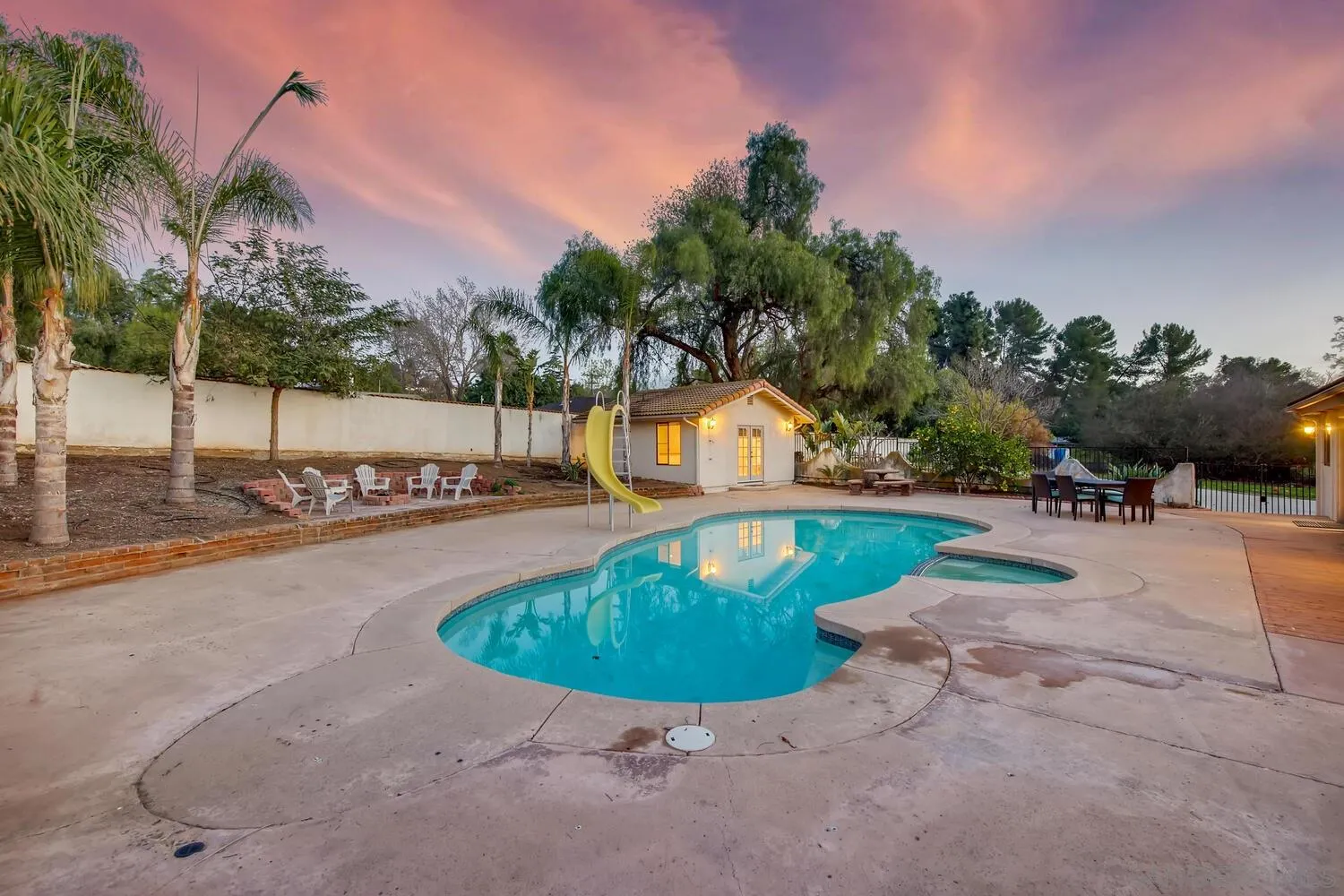 13992 Putney Road Poway, CA 92064 - Photo 33 of 38 a view of a swimming pool with a patio
