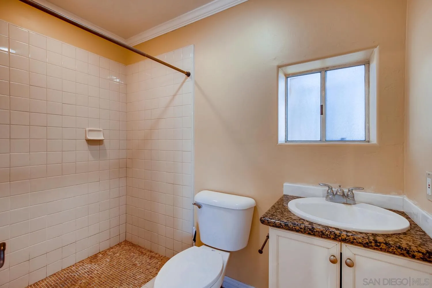 13992 Putney Road Poway, CA 92064 - Photo 38 of 38 a bathroom with a sink toilet and shower