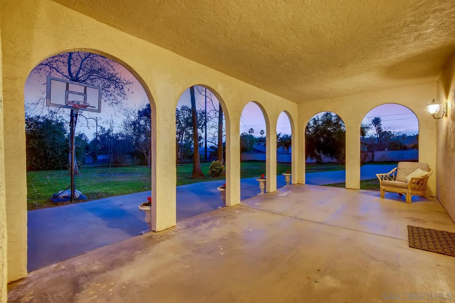 13992 Putney Road Poway, CA 92064 - Photo 6 of 38 a view of a two room with large windows