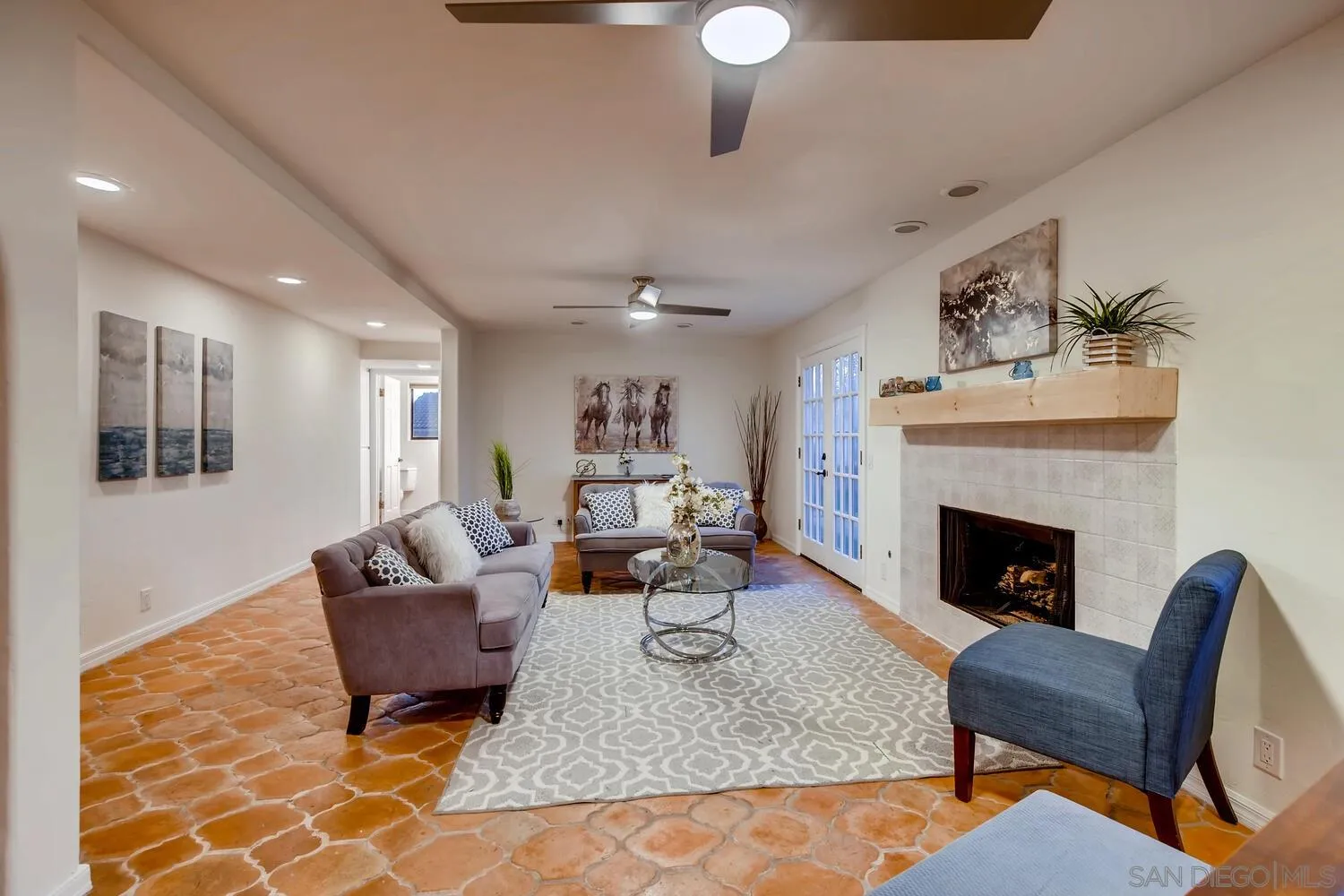 13992 Putney Road Poway, CA 92064 - Photo 8 of 38 a living room with furniture and a fireplace