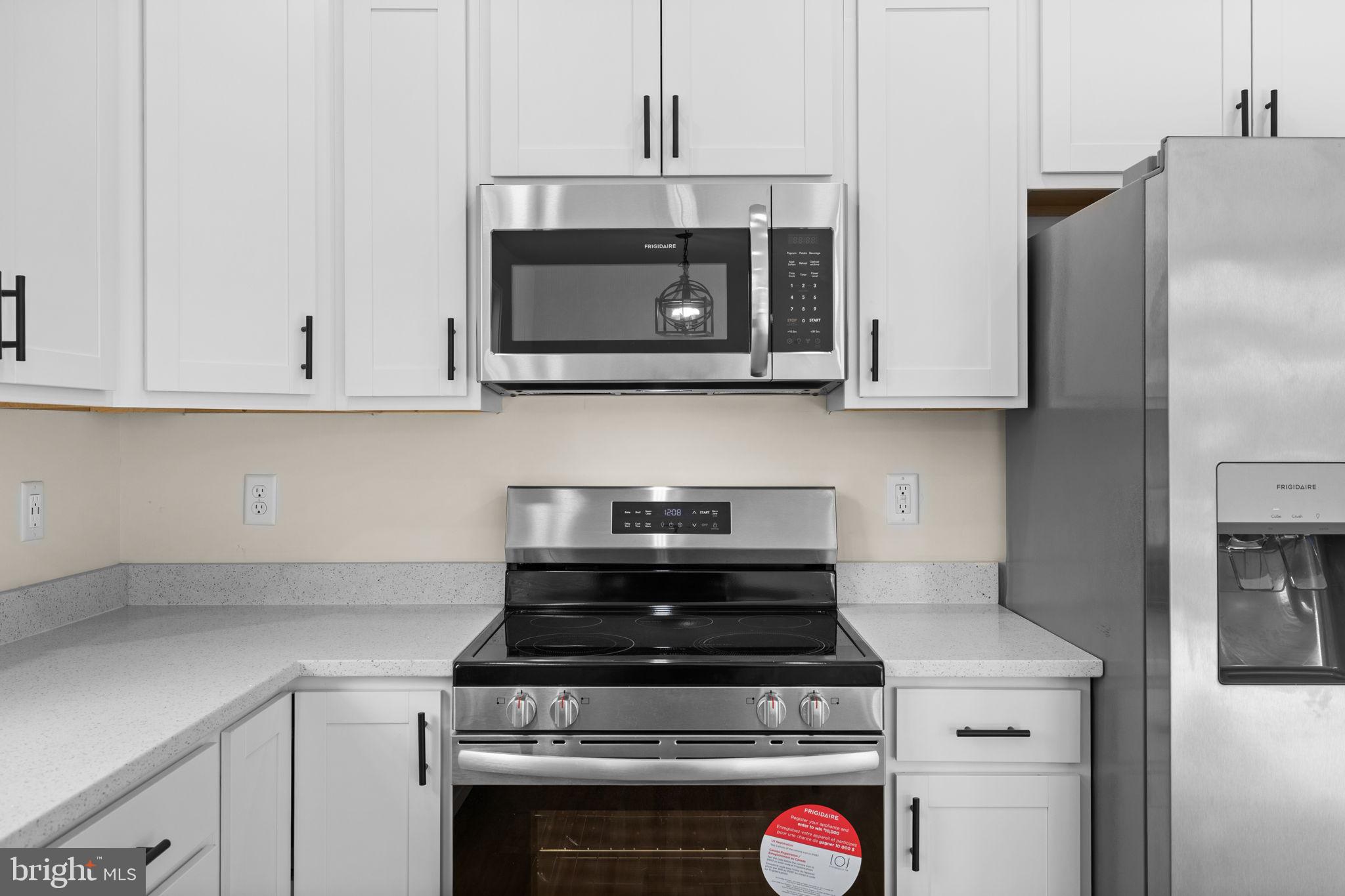 165 Bend Farm Road Fredericksburg, VA 22408 - Photo 16 of 49 a stove top oven sitting inside of a kitchen