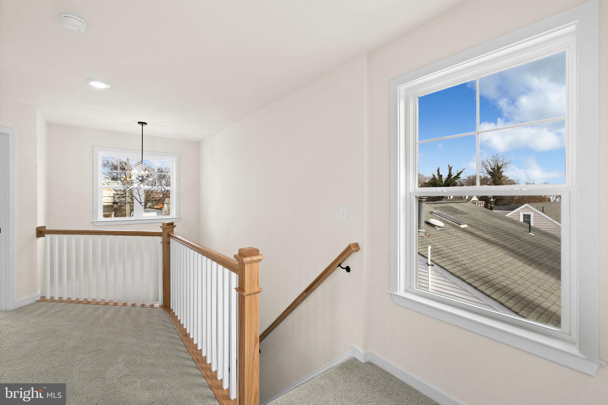 165 Bend Farm Road Fredericksburg, VA 22408 - Photo 26 of 49 a view of a hallway with wooden floor and staircase
