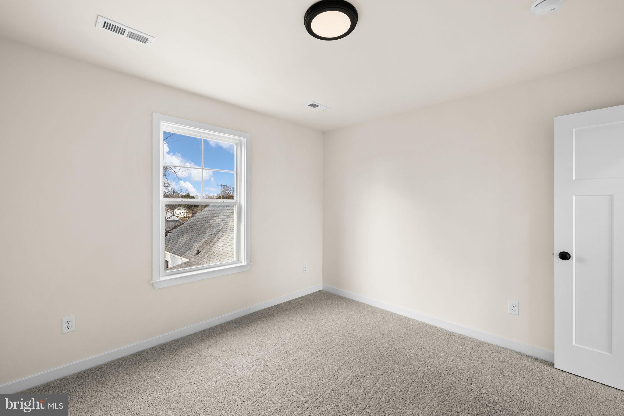 165 Bend Farm Road Fredericksburg, VA 22408 - Photo 40 of 49 an empty room with windows and closet