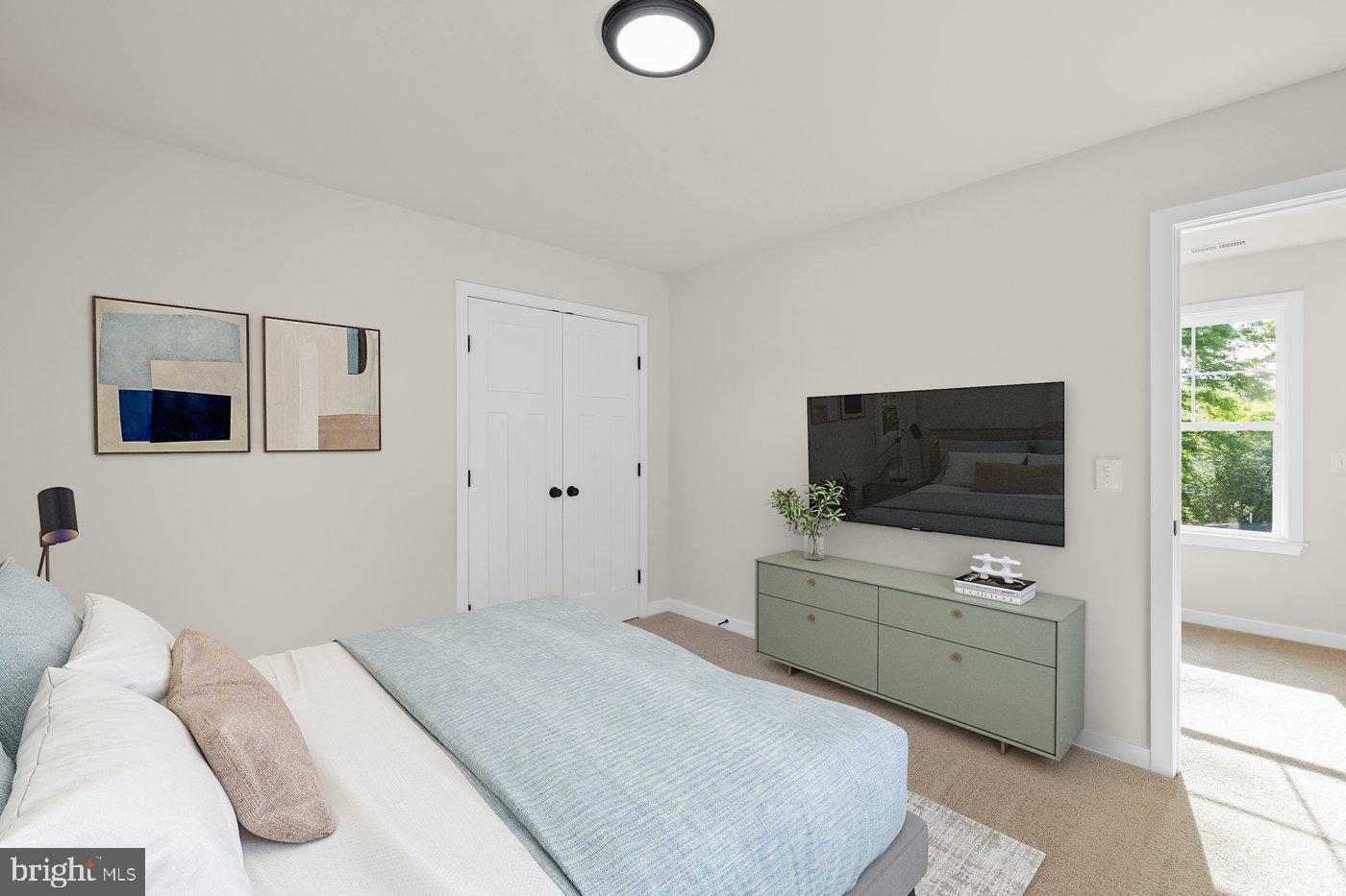 165 Bend Farm Road Fredericksburg, VA 22408 - Photo 7 of 49 a bedroom with a bed and flat screen tv