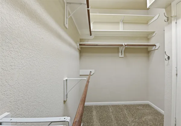 a view of small space with racks on the wall