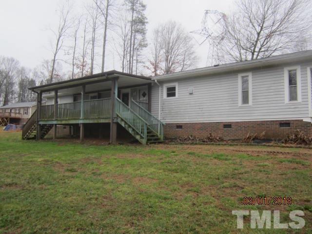 517 James Long Road Roxboro, NC 27574 - Photo 1 of 16 a view of a house with a yard