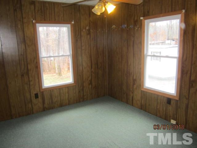 517 James Long Road Roxboro, NC 27574 - Photo 16 of 16 a view of an empty room with a window