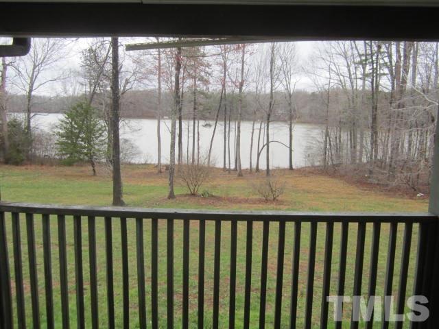 517 James Long Road Roxboro, NC 27574 - Photo 3 of 16 a view of balcony and a yard
