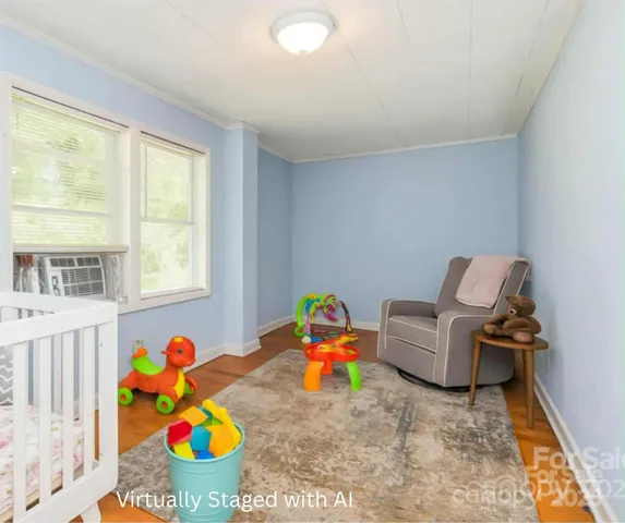 a room with toys and a large window