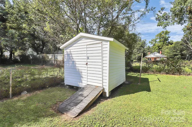 a view of backyard with green space