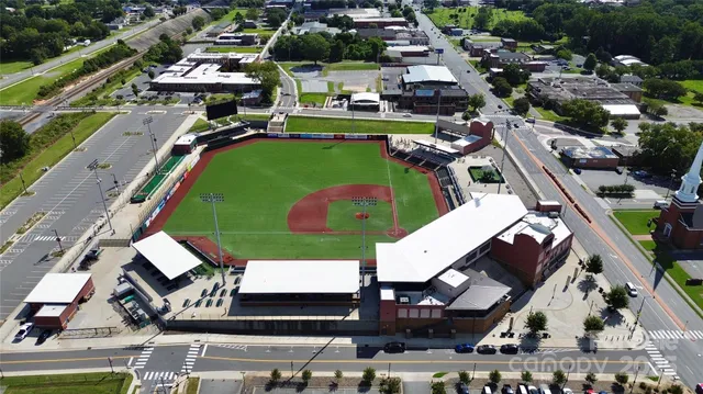 an aerial view of a tennis ground and outdoor space