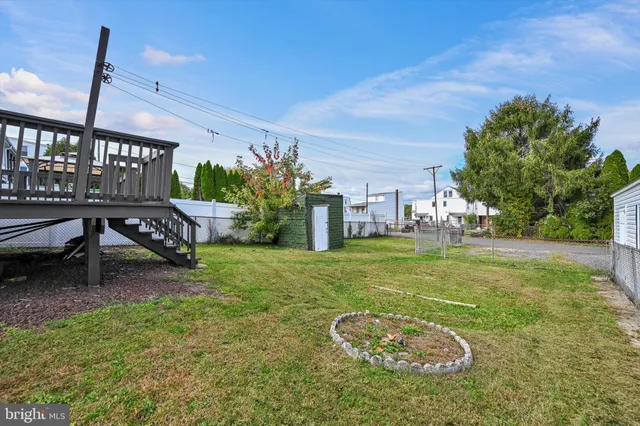 a swimming pool with yard