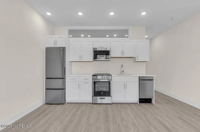 a view of an empty walk in closet