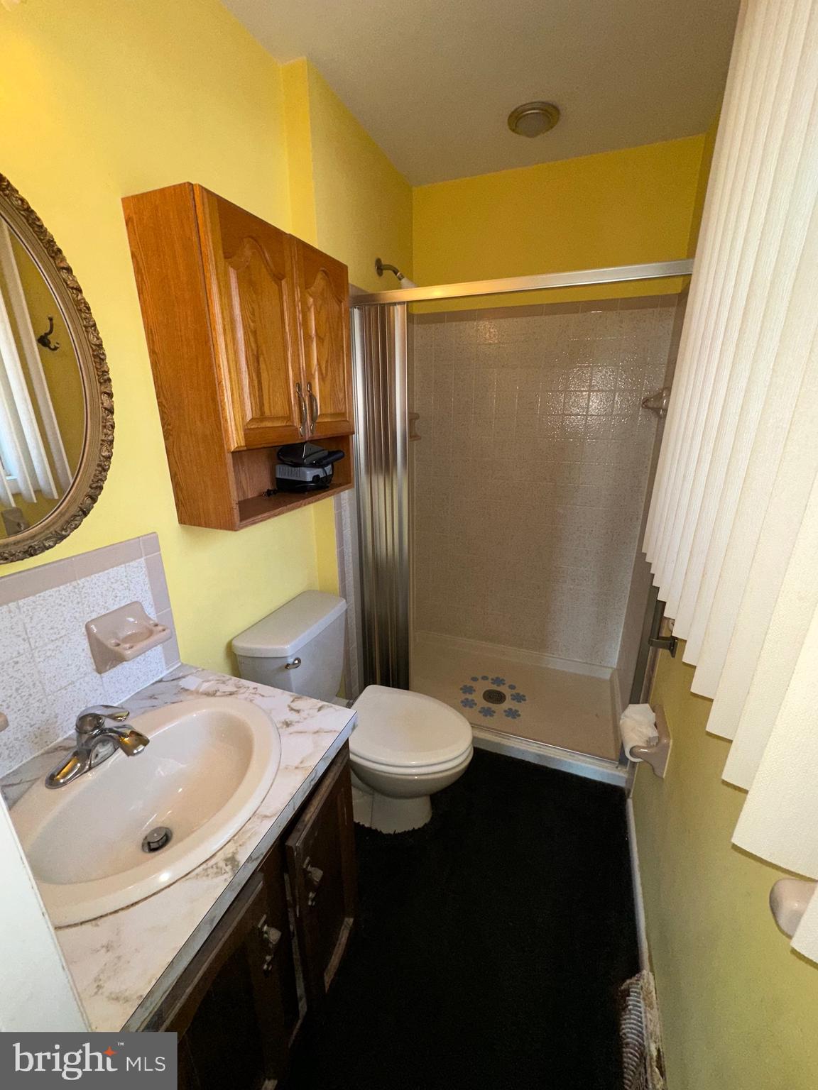 2776 Stevens Summit Drive Columbia, PA 17512 - Photo 18 of 39 a bathroom with a sink vanity mirror and toilet