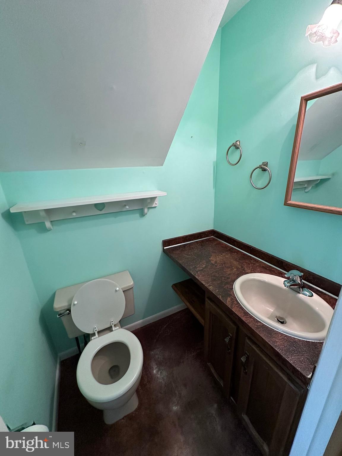 2776 Stevens Summit Drive Columbia, PA 17512 - Photo 26 of 39 a bathroom with a toilet sink and mirror