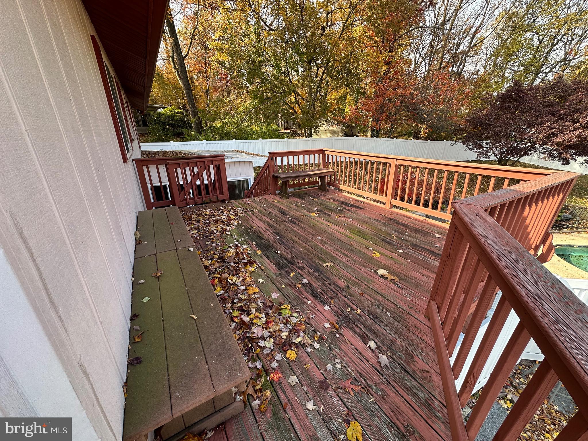 2776 Stevens Summit Drive Columbia, PA 17512 - Photo 30 of 39 a view of a roof deck with couches and wooden fence