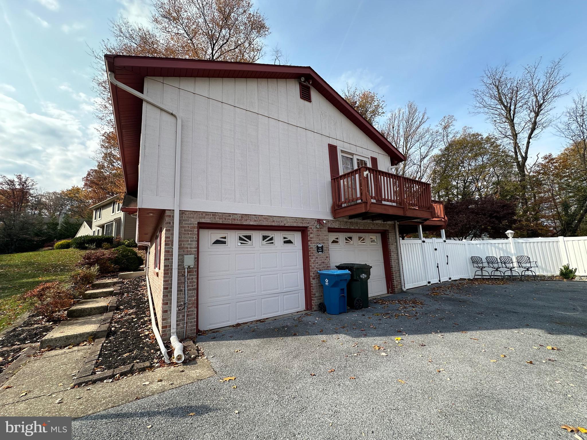 2776 Stevens Summit Drive Columbia, PA 17512 - Photo 4 of 39 a view of a house with a wooden fence