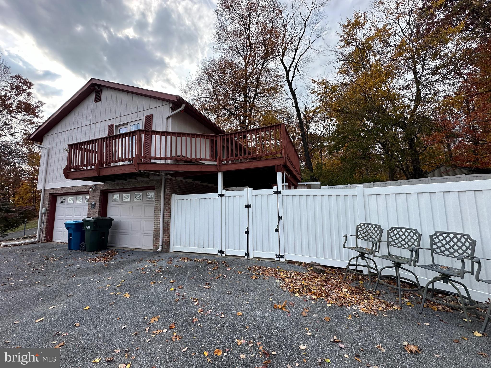 2776 Stevens Summit Drive Columbia, PA 17512 - Photo 5 of 39 a view of a house with a yard and wooden fence