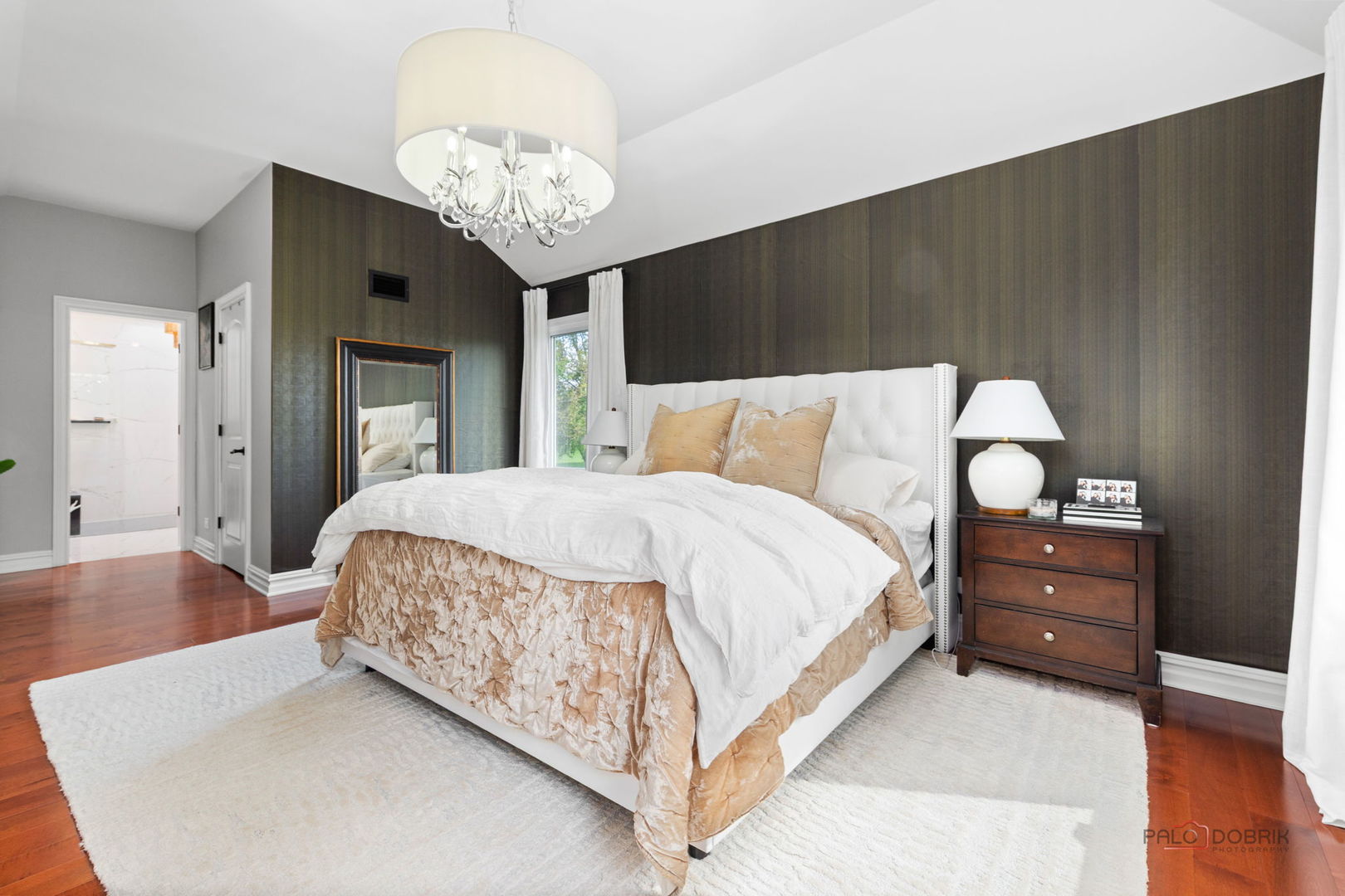 1930 Lisson Road Naperville, IL 60565 - Photo 14 of 32 a spacious bedroom with a bed and a chandelier