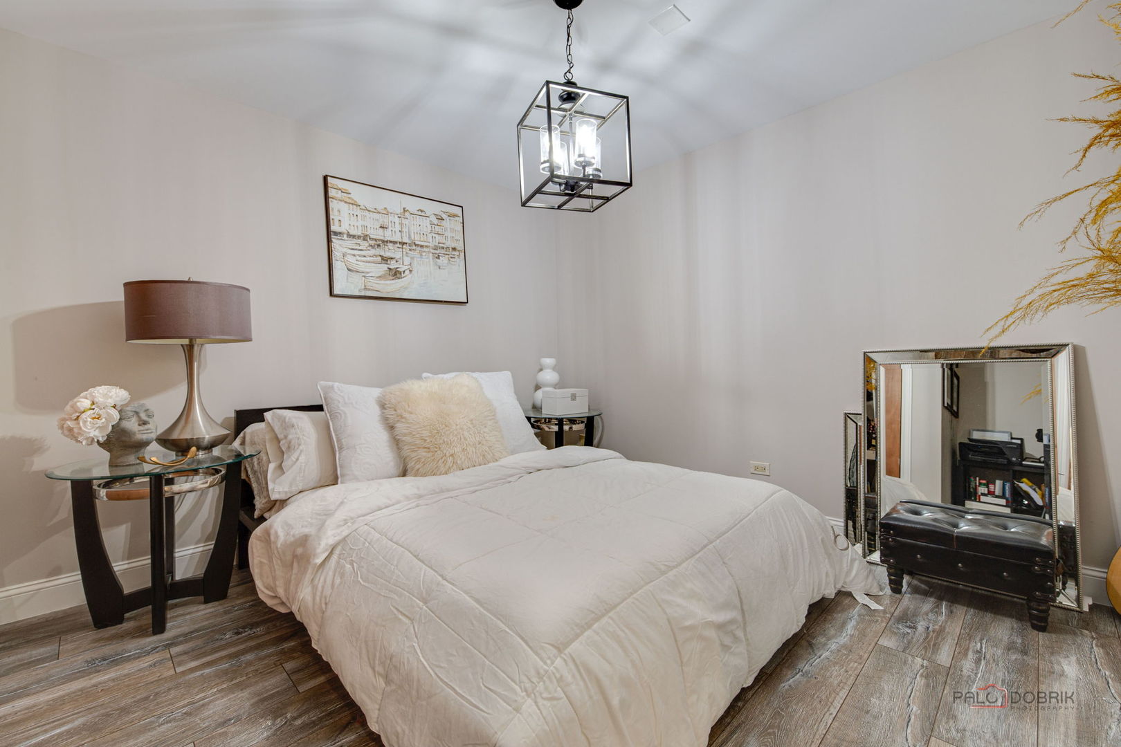 1930 Lisson Road Naperville, IL 60565 - Photo 19 of 32 a bedroom with a bed and wooden floor