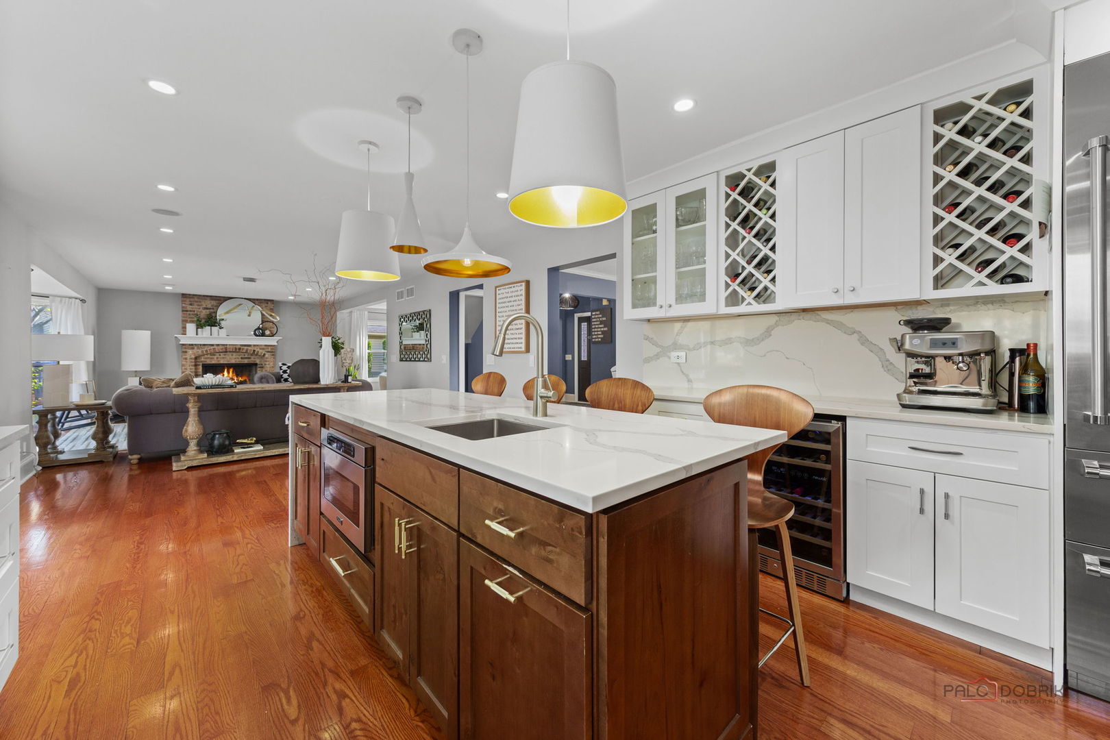 1930 Lisson Road Naperville, IL 60565 - Photo 2 of 32 a kitchen with a sink a stove cabinets and wooden floor