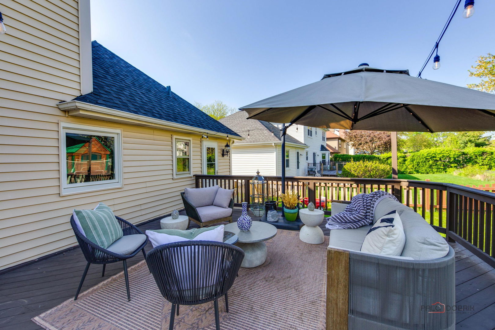 1930 Lisson Road Naperville, IL 60565 - Photo 26 of 32 a patio with wooden floor a yard a table and chairs