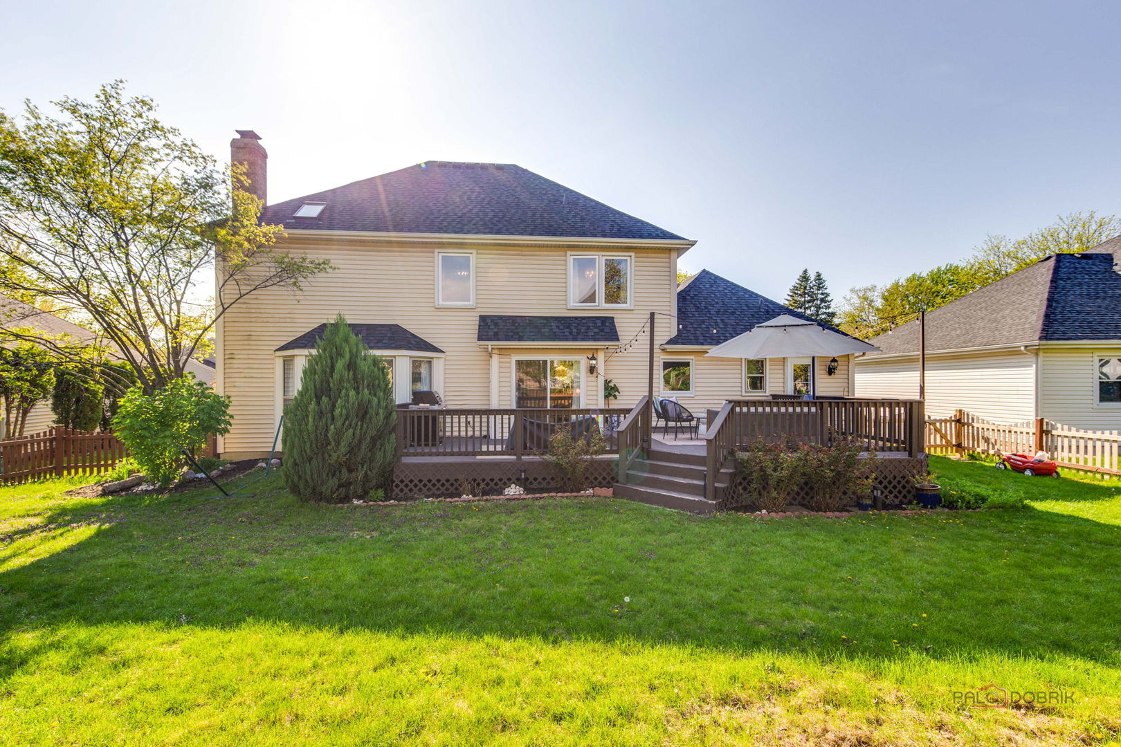 1930 Lisson Road Naperville, IL 60565 - Photo 28 of 32 a front view of a house with a garden and plants