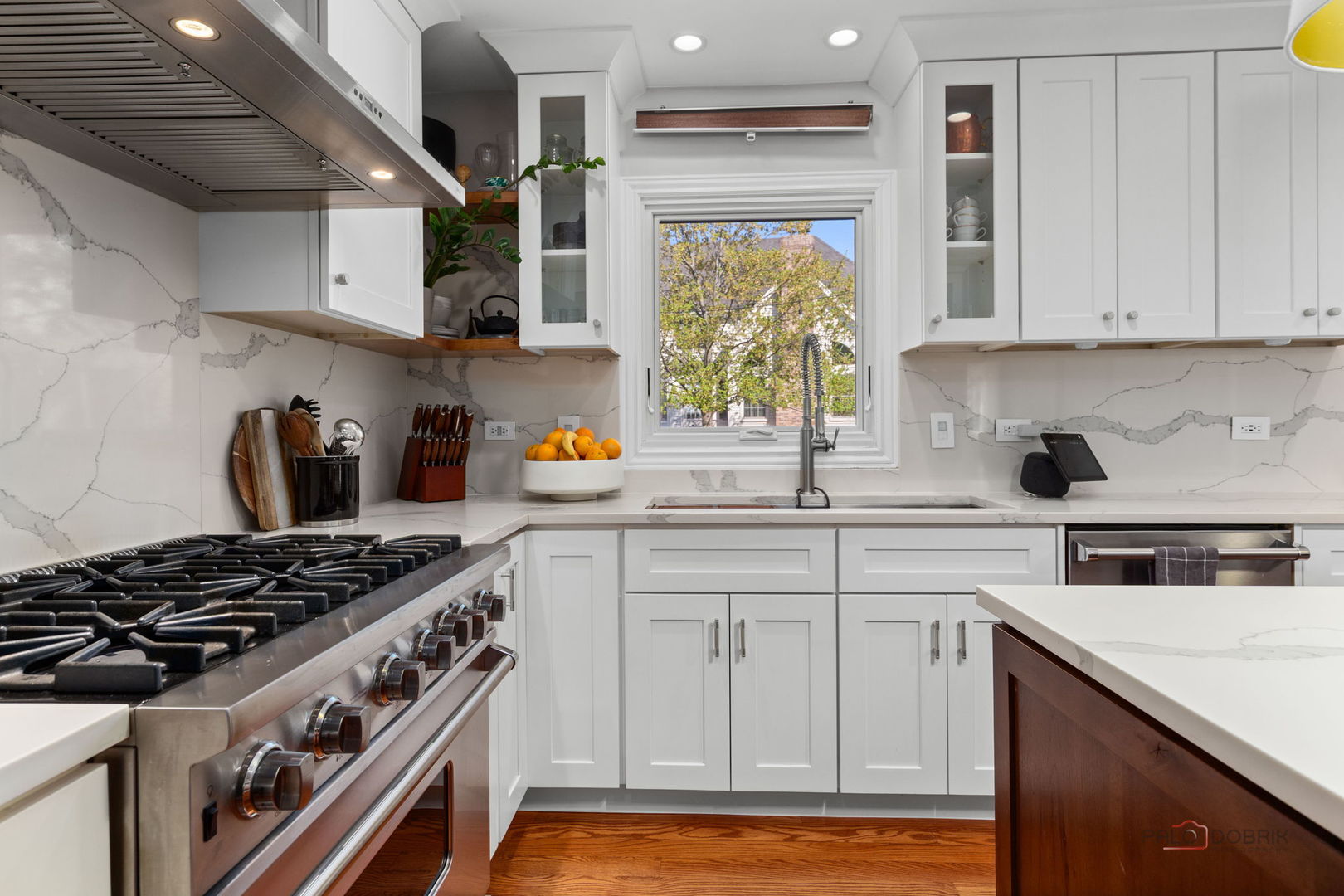 1930 Lisson Road Naperville, IL 60565 - Photo 4 of 32 a kitchen with stainless steel appliances granite countertop a stove and a sink