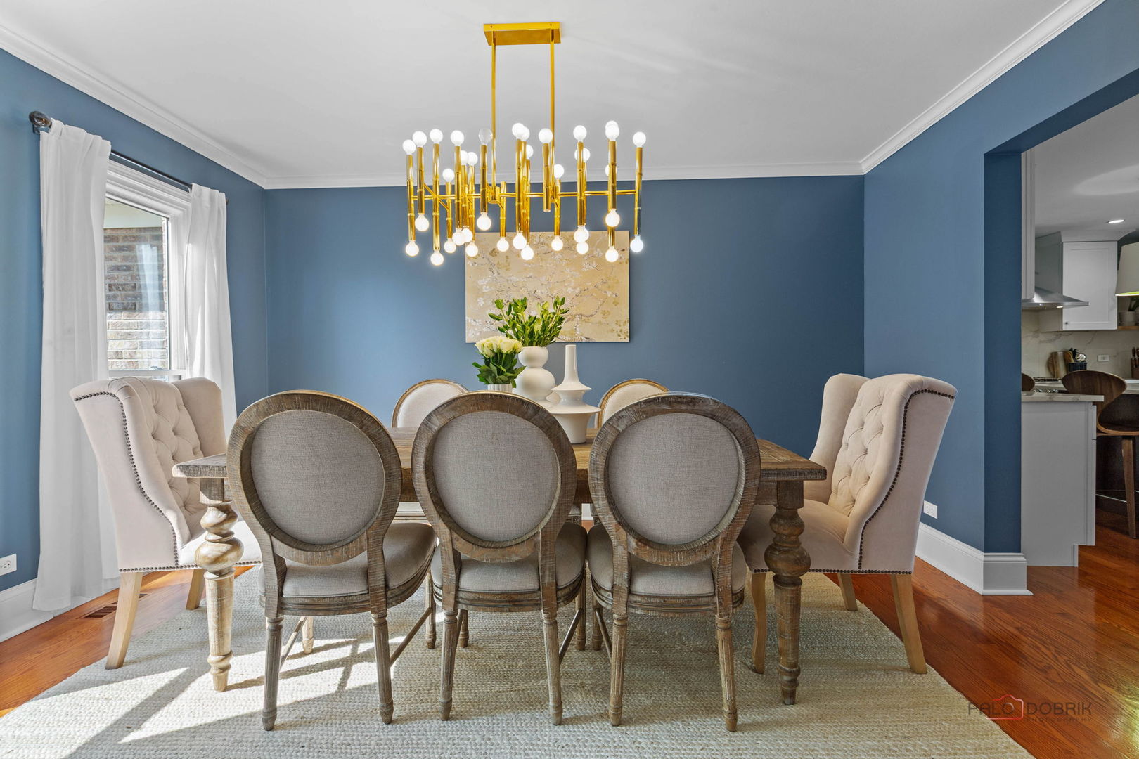 1930 Lisson Road Naperville, IL 60565 - Photo 8 of 32 a dining room filled chandelier with wooden floor view