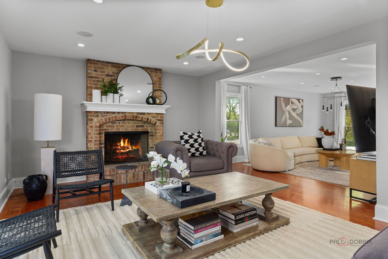 1930 Lisson Road Naperville, IL 60565 - Photo 10 of 32 a living room with furniture and a fireplace