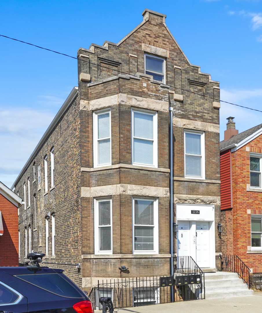 1226 West 31st Place Chicago, IL 60608 - Photo 1 of 1 a front view of a house