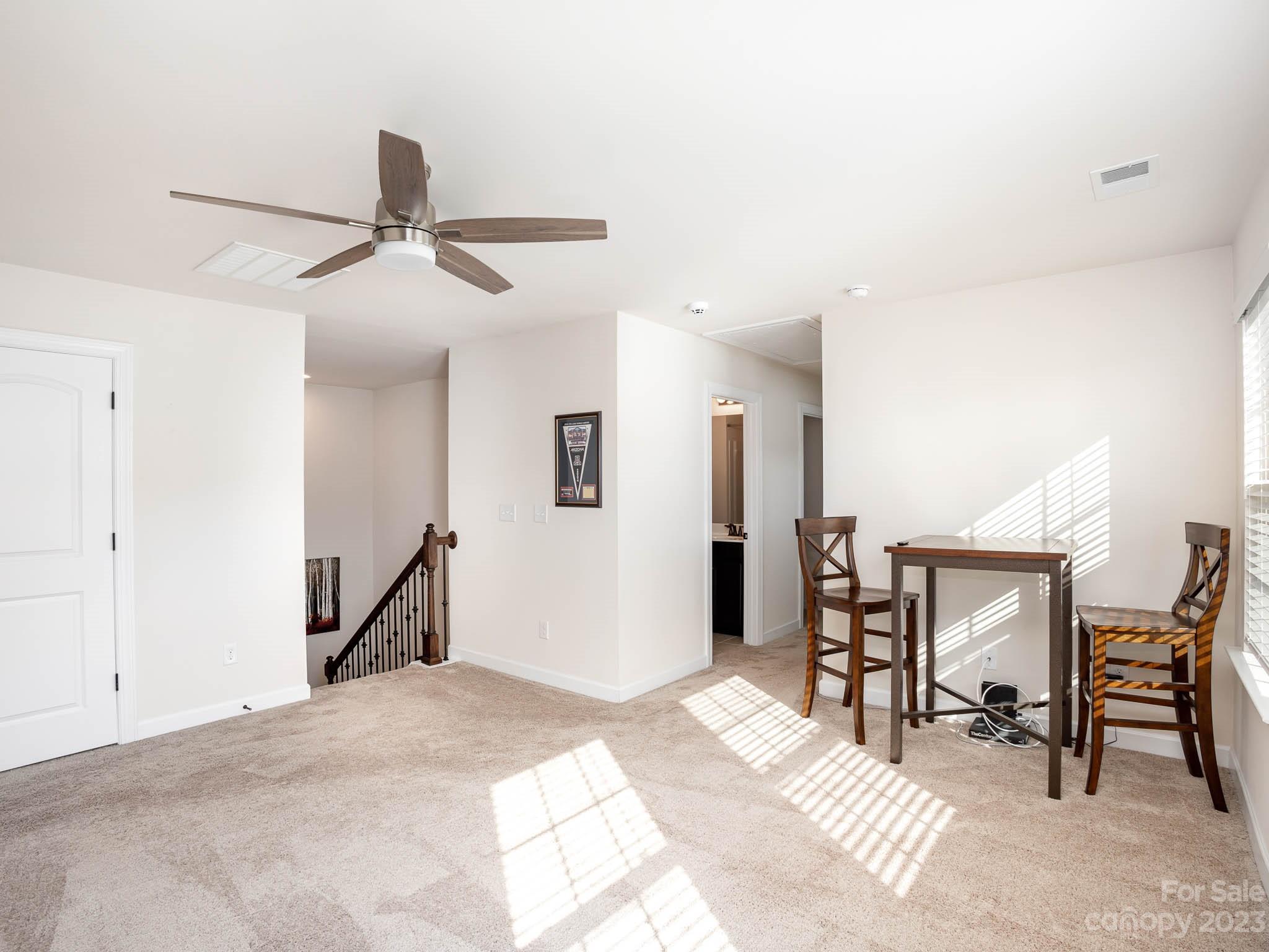 5688 Garrow Glen Road Charlotte, NC 28278 - Photo 17 of 30 a workspace with furniture and a window