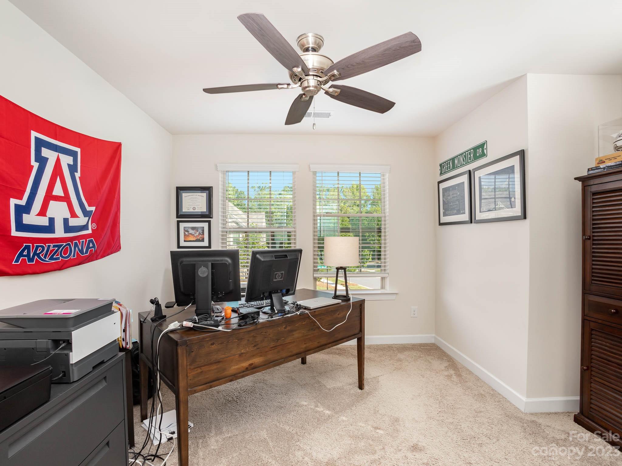 5688 Garrow Glen Road Charlotte, NC 28278 - Photo 21 of 30 a view of a workspace with furniture and a window