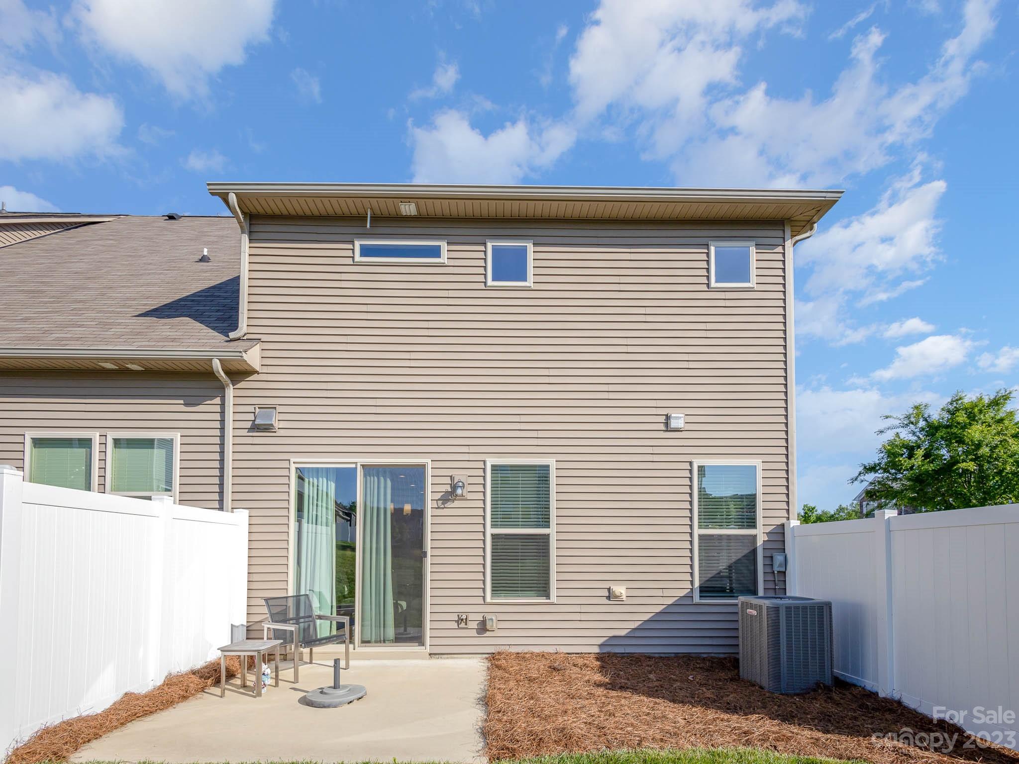 5688 Garrow Glen Road Charlotte, NC 28278 - Photo 24 of 30 a view of a house with a yard